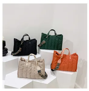 Set of four colorful quilted puffer tote bags for women's autumn winter fashion