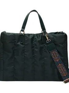 Elegante borsa tote trapuntata verde scuro con tracolla a fantasia colorata trendy