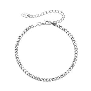 Detailed macro view of S925 sterling silver Cuban link bracelet with lobster clasp