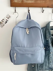 Minimalist Japanese style light blue backpack for girls, perfect for school and casual travel