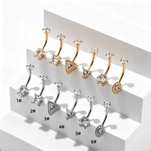 Piercing de nombril en acier 316L avec zircone cubique géométrique en or et argent.
