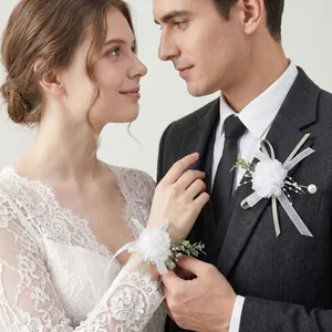 Elegant white wedding wrist corsage and boutonniere set for bridesmaid and groom accessories