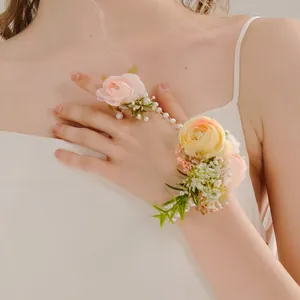 Elegant floral wrist corsage with pearl ring chain for bridesmaids, weddings and parties
