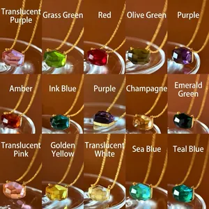 Detailed view of faceted faux crystal pendant necklaces in fifteen vibrant colors