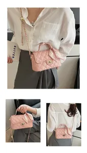 Detailed views of a pink quilted crossbody bag with decorative scarf and chain strap.