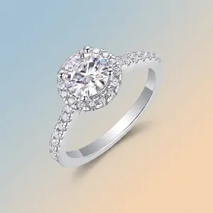 Classic S925 silver halo ring featuring a brilliant round-cut Moissanite center stone.