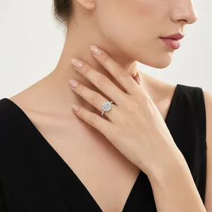 Elegant round-cut moissanite halo engagement ring in s925 silver on model