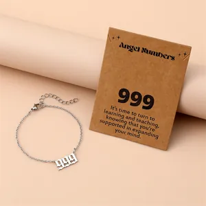 Detailed shot of 999 gothic angel number stainless steel bracelet with card message