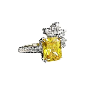 Elegant vintage yellow princess cut zircon ring with shiny floral crystal accents