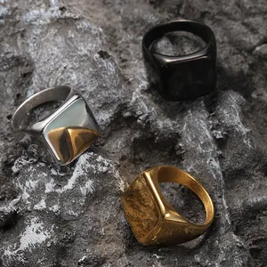 Minimalist stainless steel square signet rings in gold, silver, and black finishes.