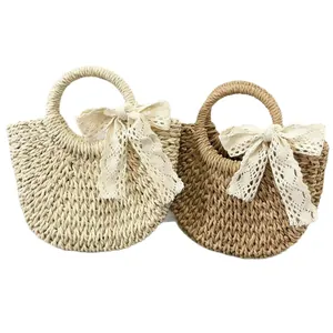 Sac à main rond en paille fait main pour enfants avec nœud en dentelle blanche