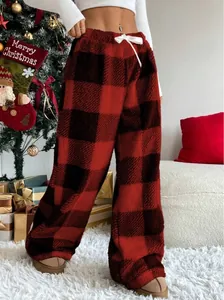 Cozy red and black buffalo plaid fleece lounge pants for winter comfort