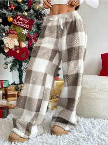 Cozy brown and white plaid fleece lounge pants designed for winter warmth and comfort