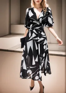 Elegant V-neck geometric print maxi dress with high elastic waist and puff sleeves