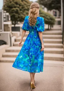 Detailed back view of a vibrant blue floral puff sleeve midi dress for summer fashion