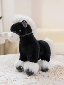 Detailed view of a soft black and white plush horse toy featuring a fluffy white mane and tail