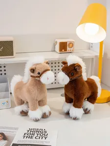 Close-up detail of realistic brown and beige plush horse toy dolls on a cozy desk