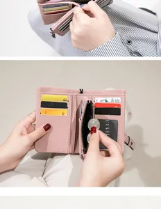 Close-up of the internal card slots and zipper coin pocket of the pink short folding wallet
