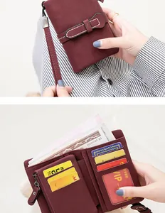 Detail view of burgundy PU leather wallet interior with card slots and money compartment