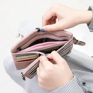 Minimalist pink PU leather short foldable wallet for women with multiple card slots
