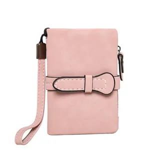 Elegant pink PU leather short wallet for women with wrist strap and decorative buckle