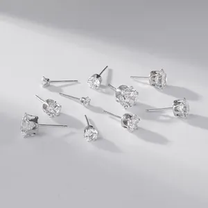 Detail view of classic six-prong cubic zirconia stud earrings in multiple sizes