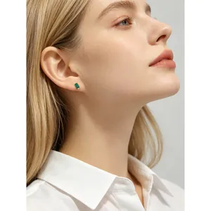 Elegant S925 silver rectangle emerald green zircon stud earrings on female model
