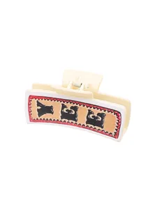 Détail d'une pince à cheveux de style western avec motif cactus en cuir
