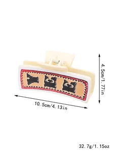 Vue détaillée de la pince à cheveux style western, dimensions 10,5x4,5 cm et poids de 32,7 g