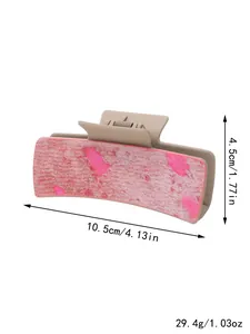 Taille 10,5cm et poids 29,4g pour la grande pince à cheveux en cuir rose