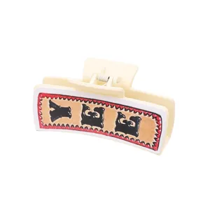 Pince à cheveux style Western avec insert décoratif en cuir à motifs en couleur crème