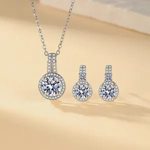 Elegant silver jewelry set featuring round zircon halo necklace and matching stud earrings