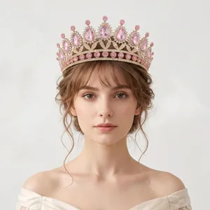 Luxurious vintage pink rhinestone queen crown tiara for bridal hair accessories.