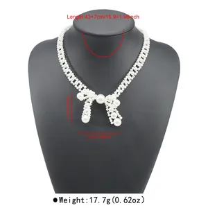 Detailed technical view of a vintage pearl bow choker necklace with size and weight info.