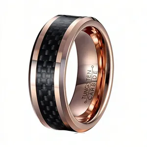 Macro view of men's tungsten steel ring with rose gold finish and black carbon fiber inlay