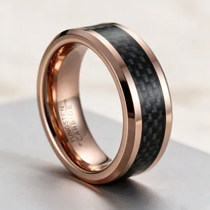 Macro detail of 8mm rose gold tungsten carbide ring with black carbon fiber inlay