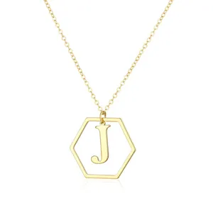 Elegant gold hexagonal pendant necklace featuring the letter J initial on a delicate O-chain.