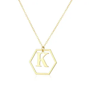 Elegant gold geometric necklace with hexagon frame and letter K initial pendant