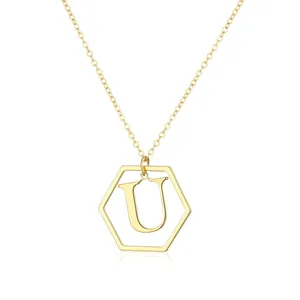 Elegant gold-colored hexagon pendant necklace featuring a minimalist letter U design