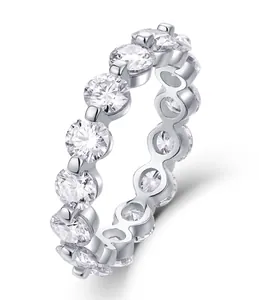 Detailed macro view of S925 sterling silver eternity ring with round moissanite stones