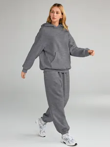 Full view of women's grey oversized hoodie and sweatpants two-piece tracksuit set