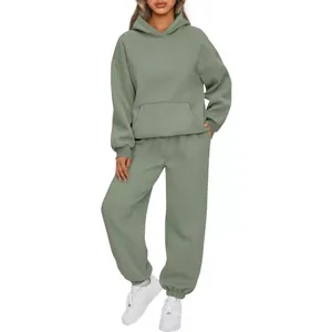 Women's two-piece sage green tracksuit with oversized hoodie and casual sweatpants