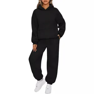 Women's comfortable black two-piece tracksuit set featuring oversized hoodie and joggers