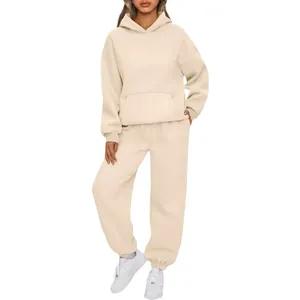 Women's cozy two-piece lounge set with oversized hoodie and joggers in cream beige