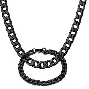 Close-up view of chunky black titanium steel Cuban link chain necklace and matching bracelet set