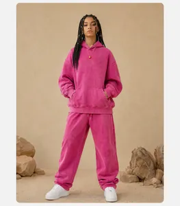 Detailed view of the pink hoodie set with vintage washed and distressed texture