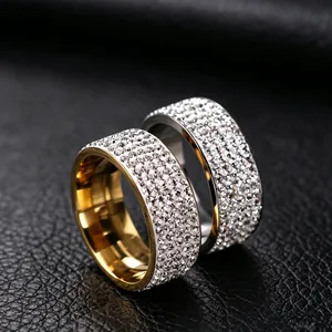 High-definition close-up of luxury five-row sparkling crystal pave titanium steel rings