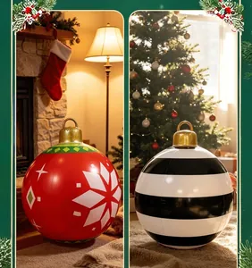 Large inflatable PVC Christmas balls with snowflake and striped patterns in cozy indoor settings
