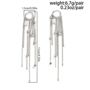 Detailed product view of long tassel pearl earrings with length and weight stats