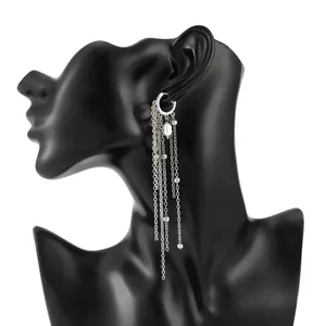 Silver long tassel chain earrings with pearl detail on a black display mannequin